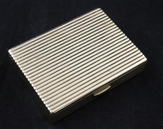 A 1940s Cartier ribbed 9ct gold rectangular cigarette box, 123 grams.